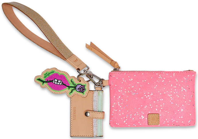 Pink speckled wristlet wallet with neon pink star glitter, tan strap, tan and mint card slot wallet, and keychain featuring a cartoon mouth with green lips and white teeth. Available sizes: One size.