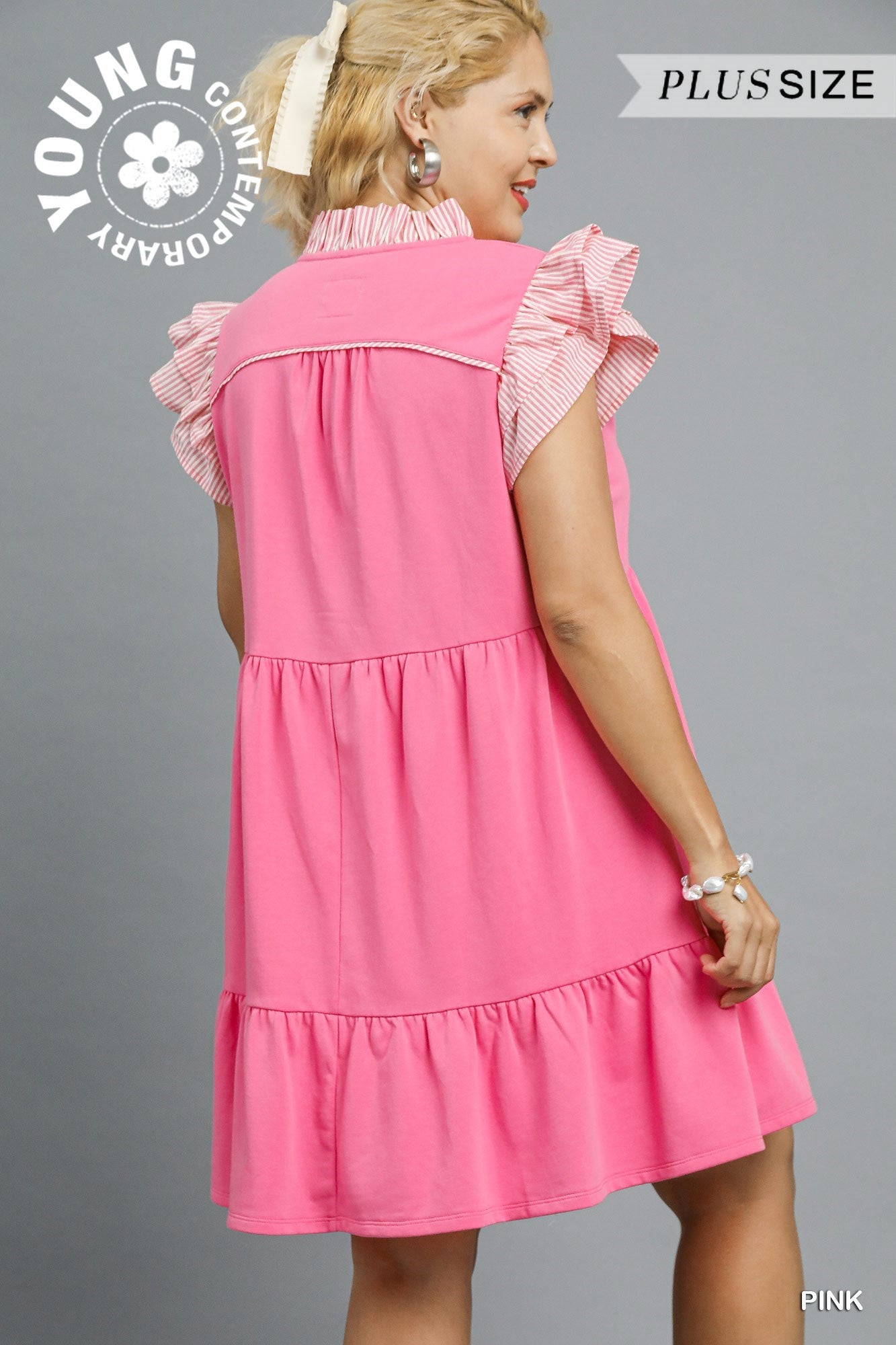Pink plus-size dress with striped ruffle sleeves and tiered skirt; available in plus sizes. Text: "YOUNG CONTEMPORARY.