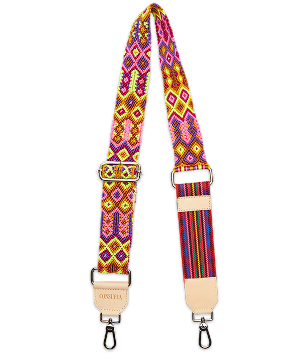 The Consuela Woven Crossbody Strap, Bubbles, features vibrant geometric patterns in pink, yellow, and orange. It has metal clips at each end and a beige leather patch with text. Adjustable length for customizable fit.