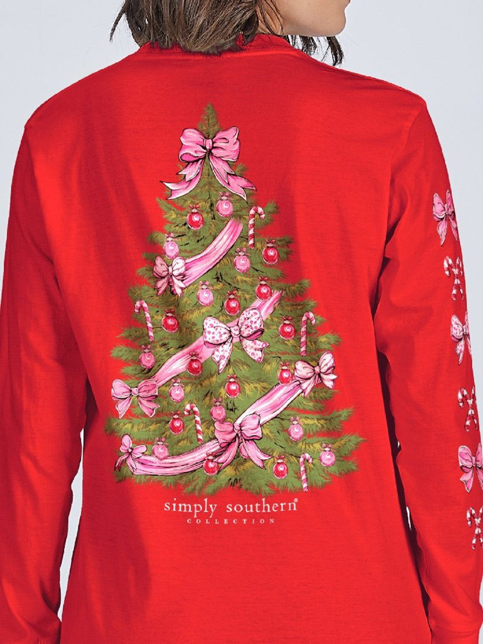 Youth Red Christmas Tree LS T-Shirt with back graphic of a Christmas tree decorated with pink ribbons, bows, ornaments, and candy canes.