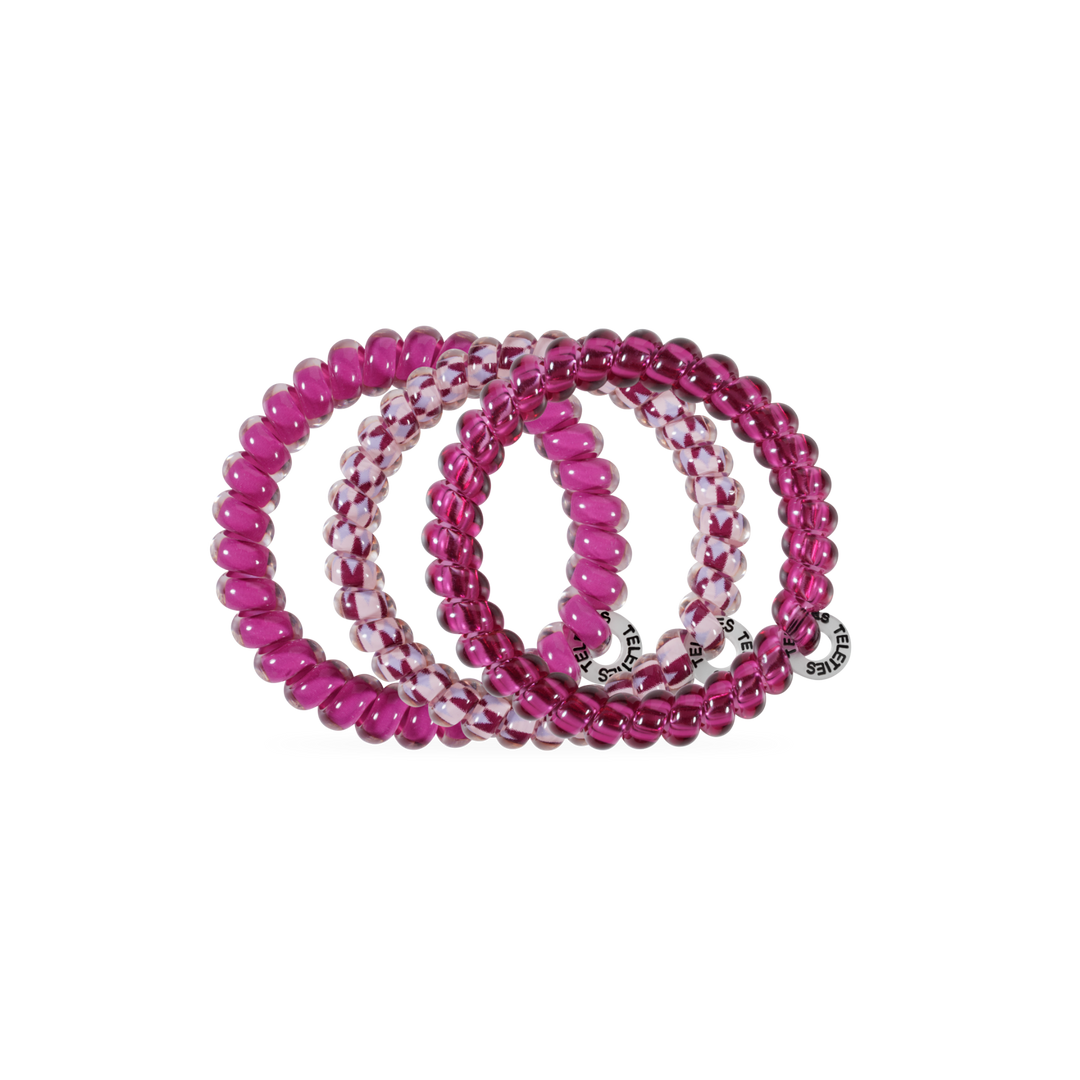 Three Merlot after Midnight Small Hair Ties in pink and white shades with round “invisibobble” tags, available in small size. No-crease, secure, gentle hold.