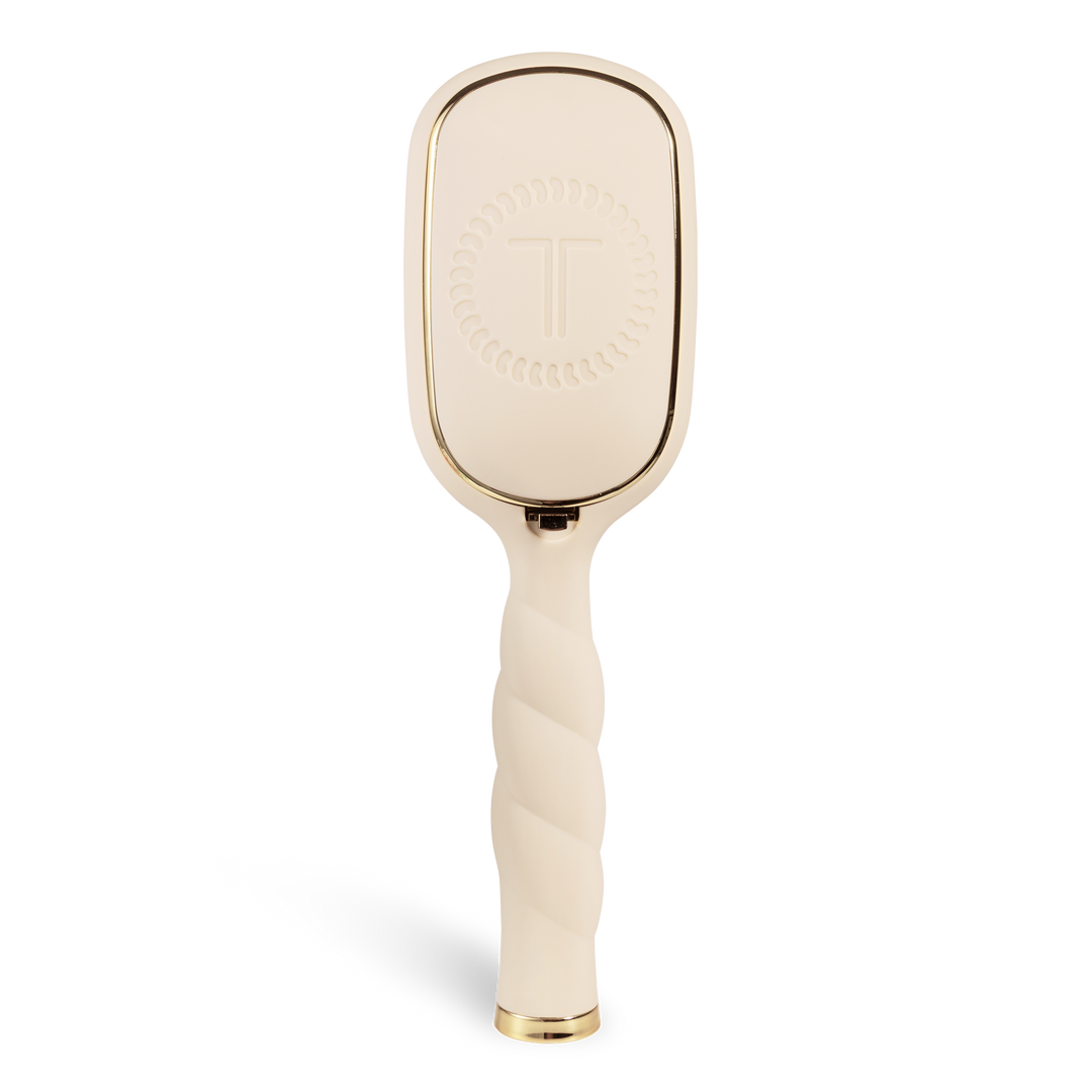 Tan Detangler Hair Brush for medium hair with twisted handle, gold accents, and a raised circular “T” pattern on the back. Available in multiple sizes.