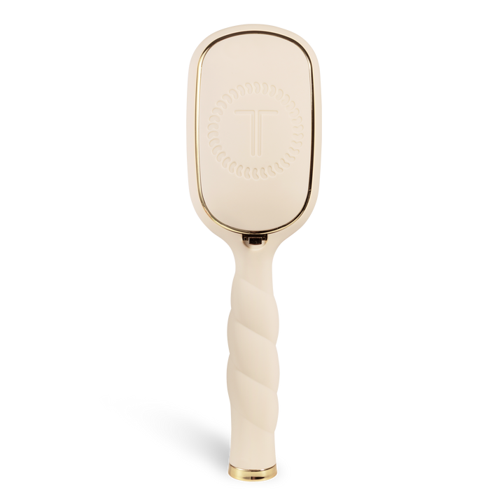 Tan Detangler Hair Brush for medium hair with twisted handle, gold accents, and a raised circular “T” pattern on the back. Available in multiple sizes.