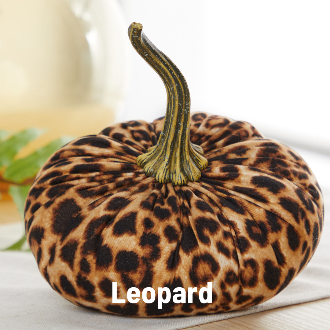 Large velvet pumpkin with soft leopard print fabric and lifelike green stem, “Leopard” in white text at the base. Available in large size.