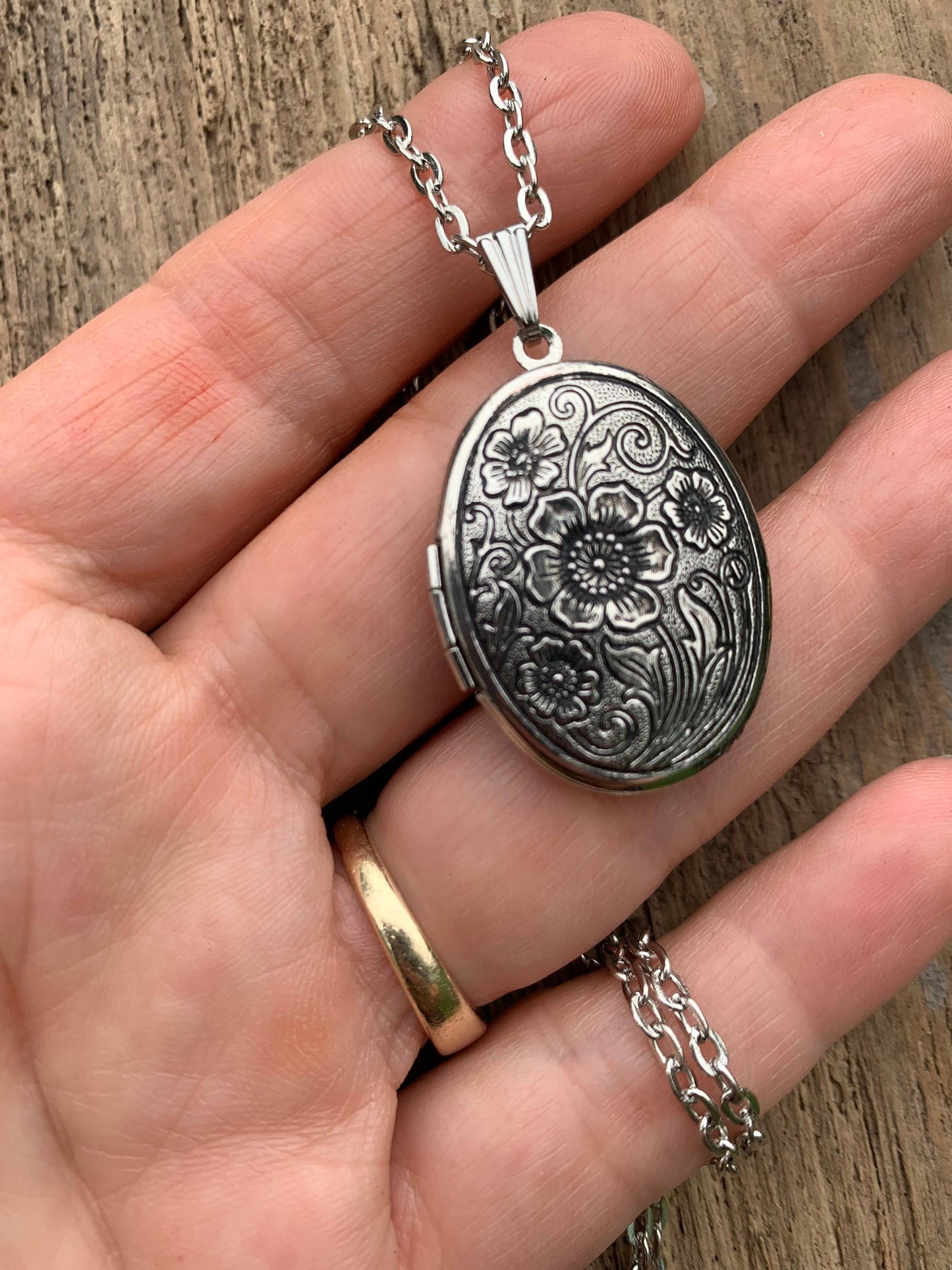 Vintage-style antiqued silver locket with Moonflower solid perfume on a silver chain; available in small and large sizes.