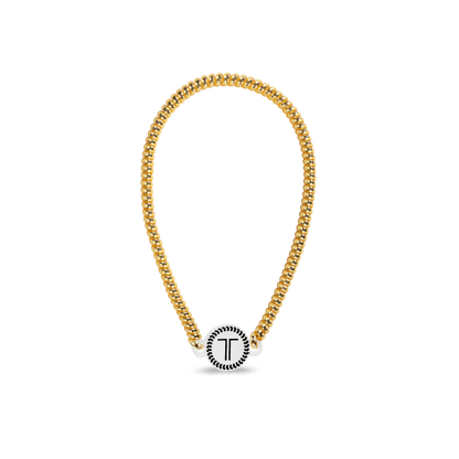 Gold chain bracelet with round white clasp, black "T" design. Available in small, medium, and large sizes.