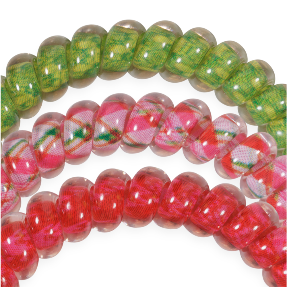 And to All a Good Night Small hair ties featuring three no-crease spiral coils in green plaid, pink plaid, and solid pink.