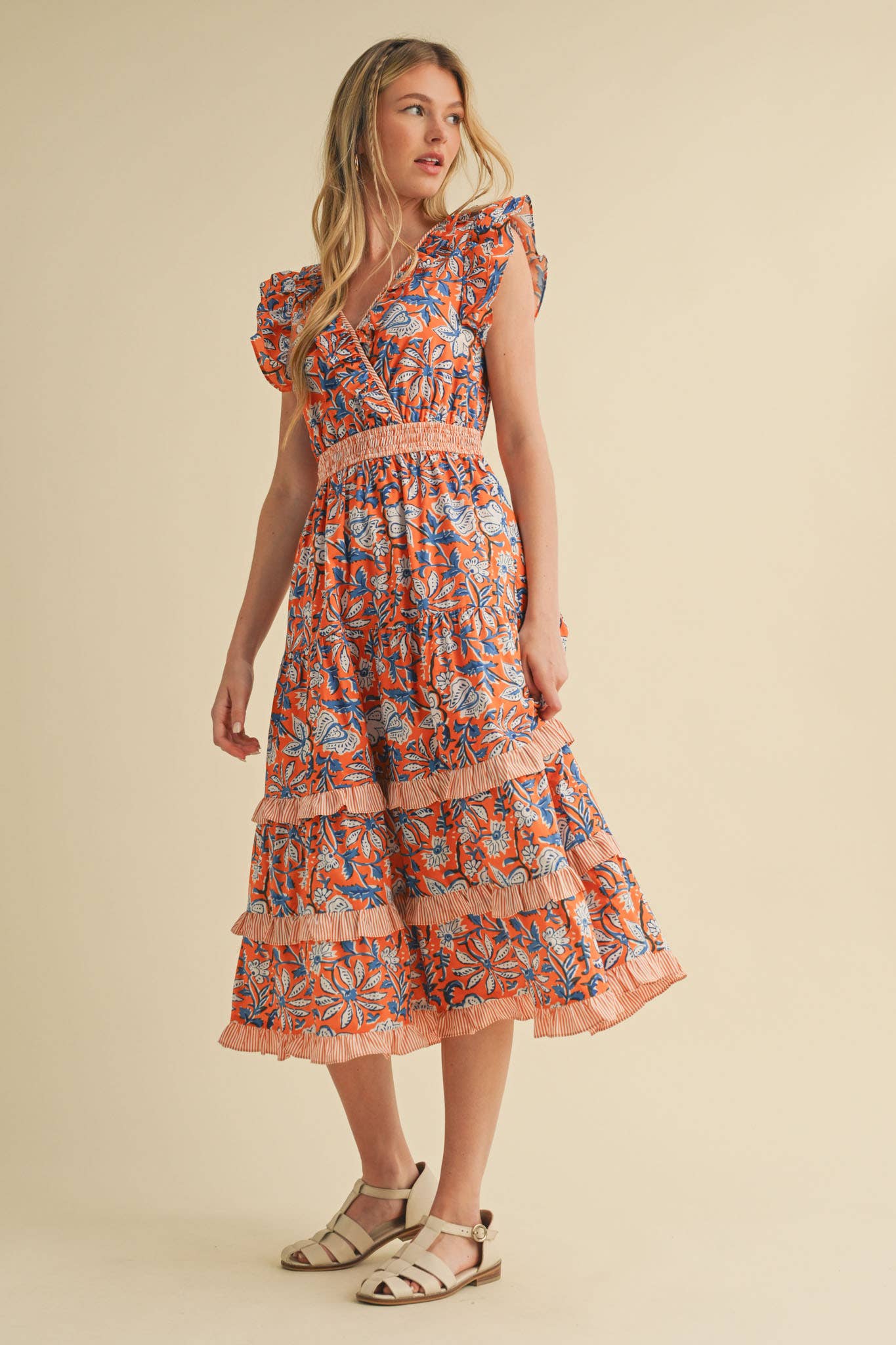 Mixed Floral Print Ruffle Trim Midi Dress with ruffled sleeves, tiered skirt, smocked waistband. Sizes: XS-XL.