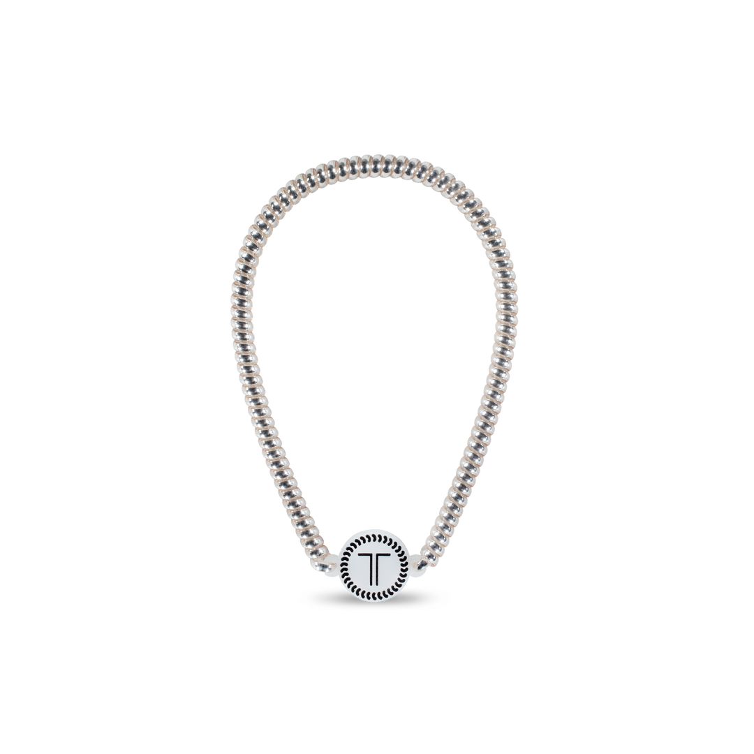 Silver beaded necklace with round “T” pendant and decorative border. Available in 16", 18", and 20" sizes.