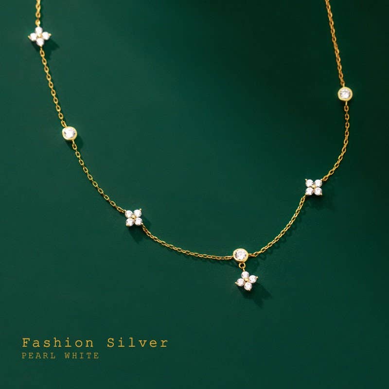 Four Petal Flower Friendship Necklace in 925 sterling silver with white pearls, cubic zirconia charms. Sizes: S, M, L.