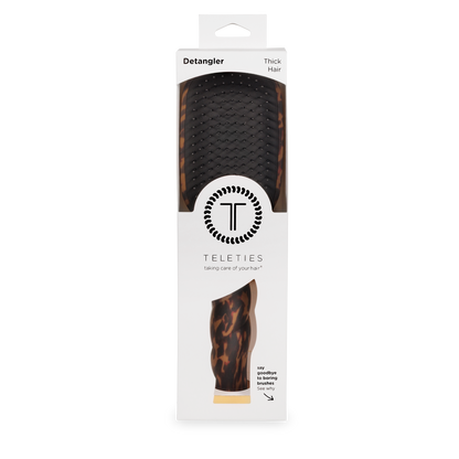 Detangler Hair Brush for Thick Hair - Tortoise, packaged in a white box labeled “TELETIES Detangler,” with the tortoiseshell brush visible through a clear window. Available in multiple sizes.