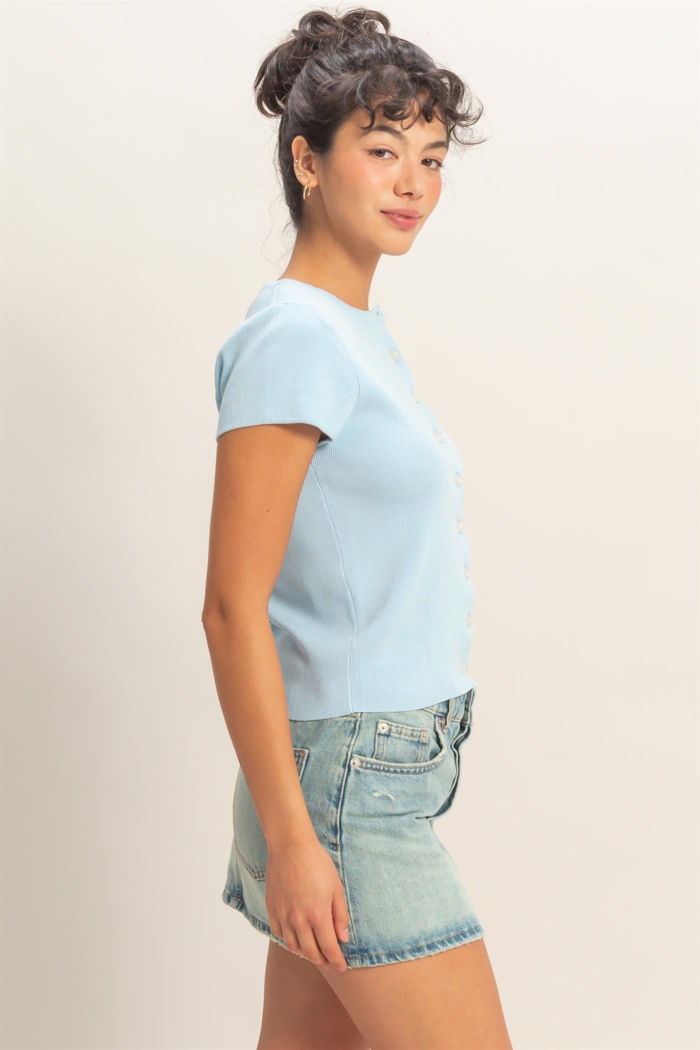 Light blue Button Front Short Sleeve Knit Top, available in sizes XS-XL.