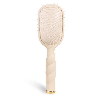 Tan Detangler Hair Brush for Medium Hair with a twisted beige handle, white bristles, and gold accent at the base. Available in medium size.