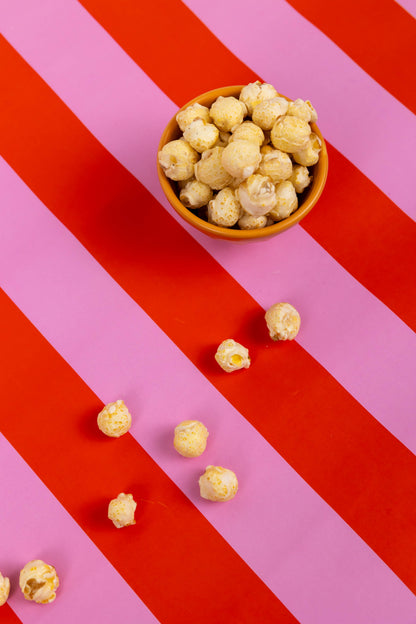 Funnel Cake Popcorn in a bowl. Available in small, medium, and large sizes.