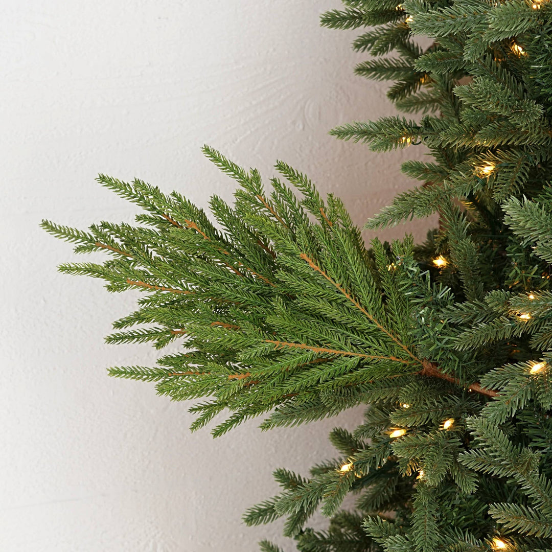 19” Spray-Soft Touch Evergreen Norfolk Pine with soft needles and warm white fairy lights.