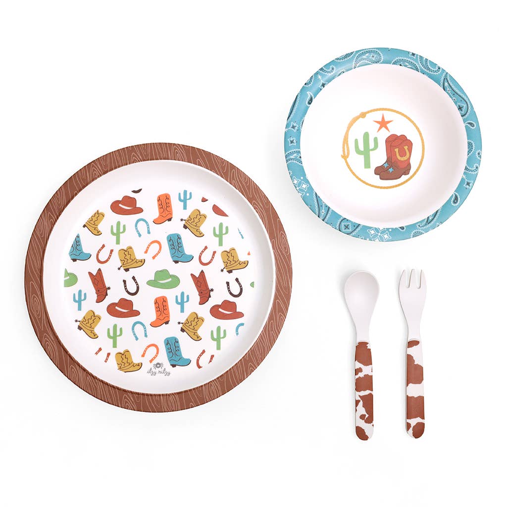 Itzy Bistro™ 4-Piece BPA-free toddler dining set: Western-themed plate, bowl, cow-print utensils. Sizes: toddler.