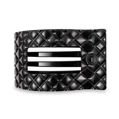 Glossy black TELETIES Flat Rectangle Hair Clip with quilted pattern, two center slits, circular button. Available in multiple sizes.