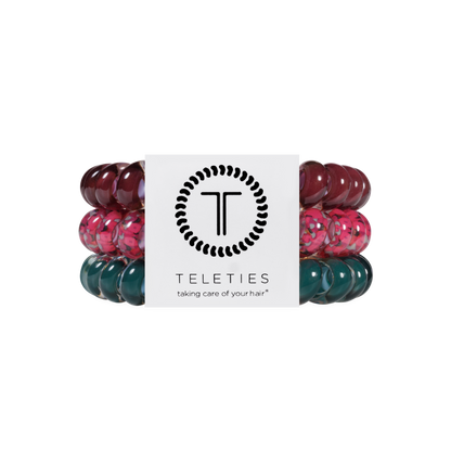 Three Harvest Hues Large Hair Ties from TELETIES in burgundy, floral pink, and teal spiral coils, secured with a branded card. Available in large size. No-crease hair ties for gentle, stylish hold.