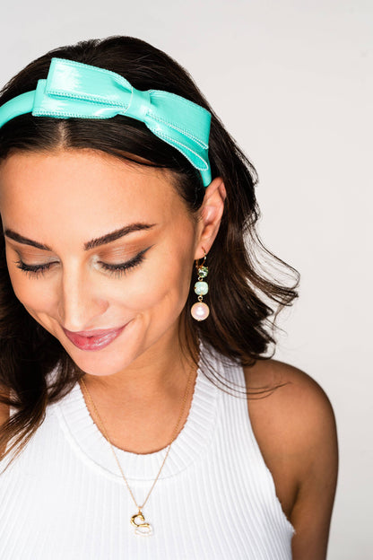 Sloane Mini Bow Headband in turquoise, available in S, M, L.