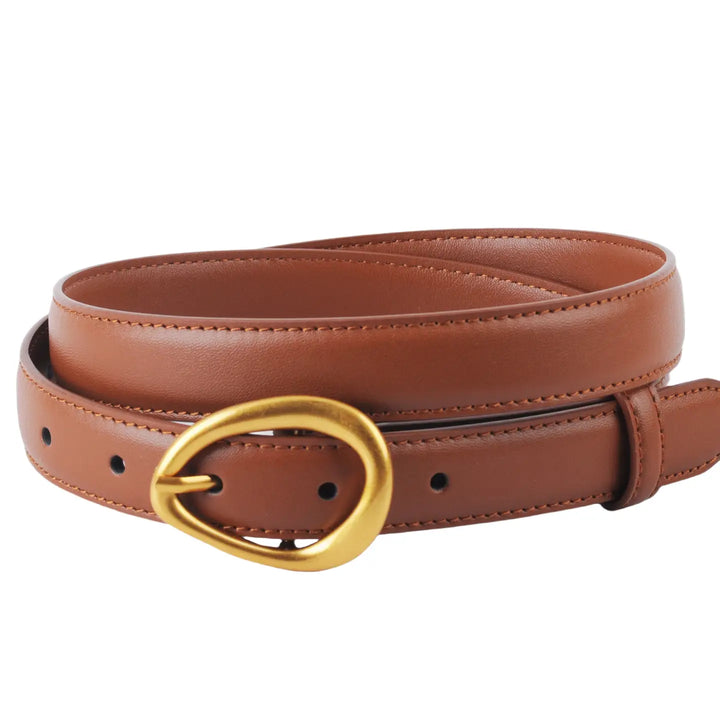 The Basic Leather Belt with Asymmetrical Buckle is available in sizes S, M, L, and XL.