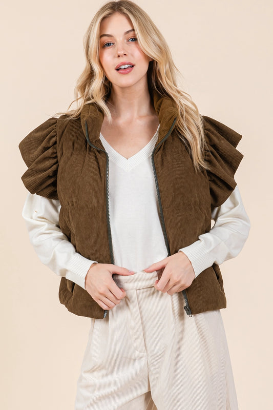 Brown Puff & Ruffle Corduroy Vest, designed for layering, adds texture and warmth. Available in sizes XS, S, M, L, XL.