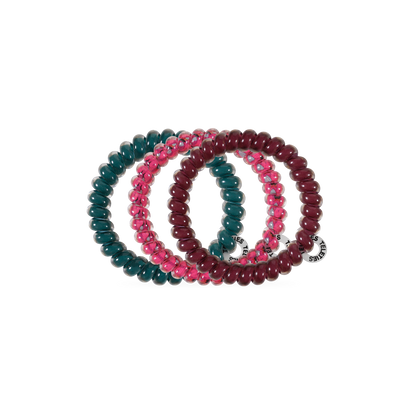 Three Harvest Hues Small Hair Ties in teal, pink, and burgundy. No-crease TELETIES designed for secure hold. Available in small size.