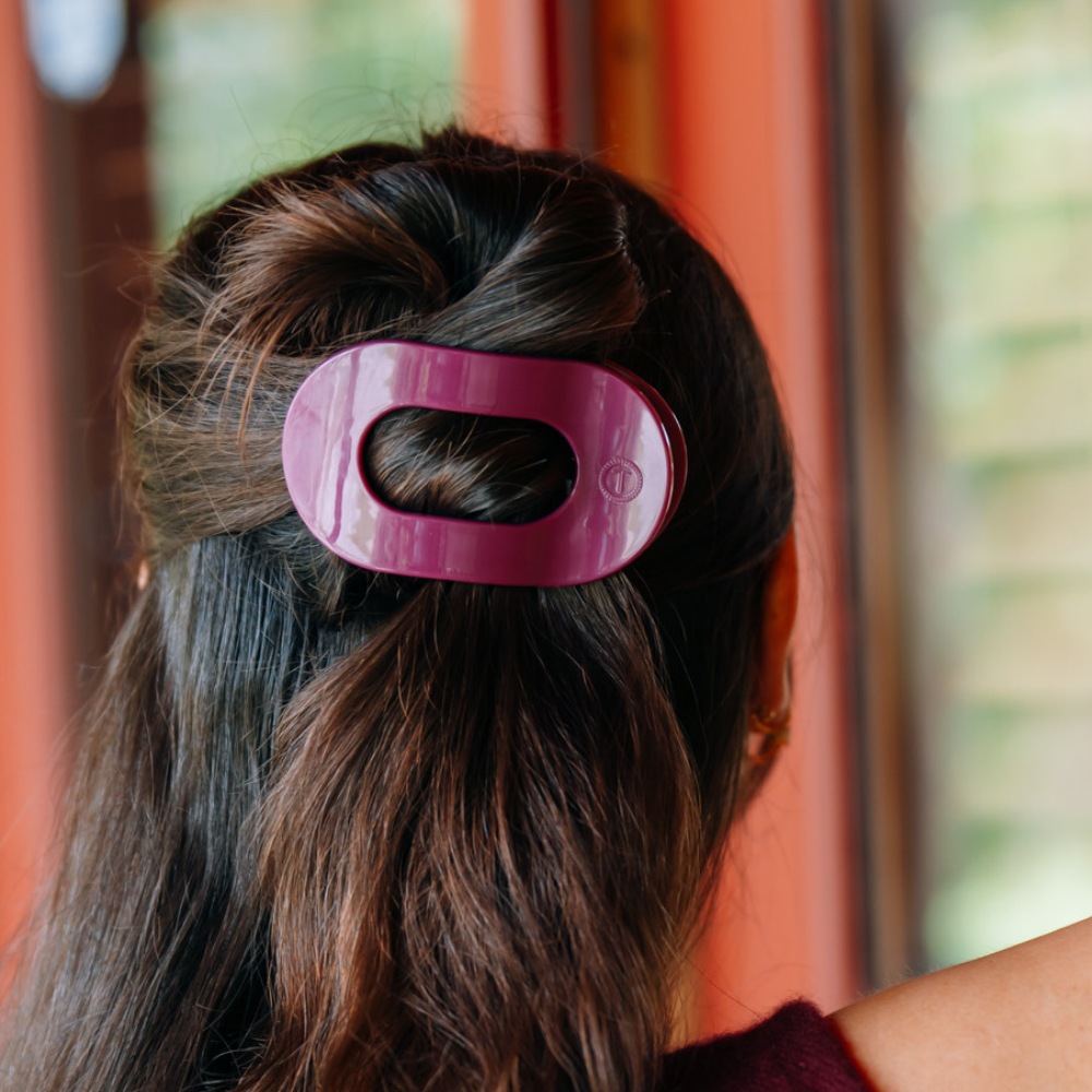 Mulberry Medium Flat Round Hair Clip securing a hair twist; available in multiple sizes, including medium.