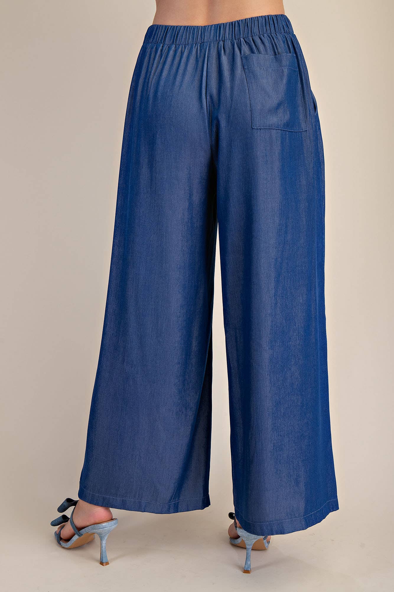 Indigo Elastic Band Drawstring Wide Pants with back pocket, breathable fabric. Sizes: S, M, L, XL.