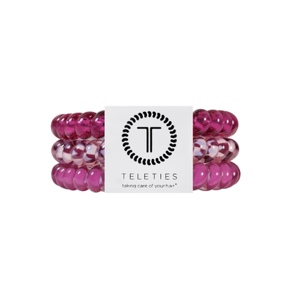 Set of three small Merlot after Midnight hair ties in rich pink, wrapped with a white TELETIES label and slogan. No-crease design, available in size small.