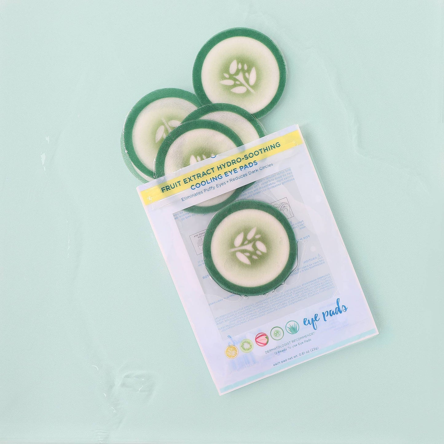Five green Cucumber Hydro-Soothing Cooling Eye Pads, 12-pack available; hydrates skin and reduces dark circles.