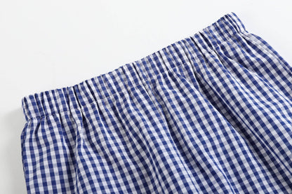 Royal blue gingham shorts with elastic waistband, blue and white check pattern. Available in sizes 2T-6.