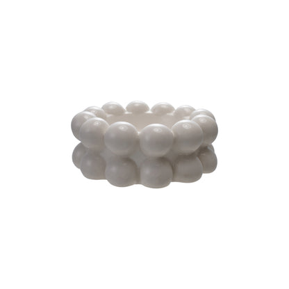 5-3/4" round x 2-1/4"H stoneware bowl with raised spheres and textured white exterior. Available in this size only.