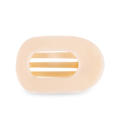 A beige TELETIES Flat Round Hair Clip designed with slotted openings for drainage. Available sizes: Small, Large.