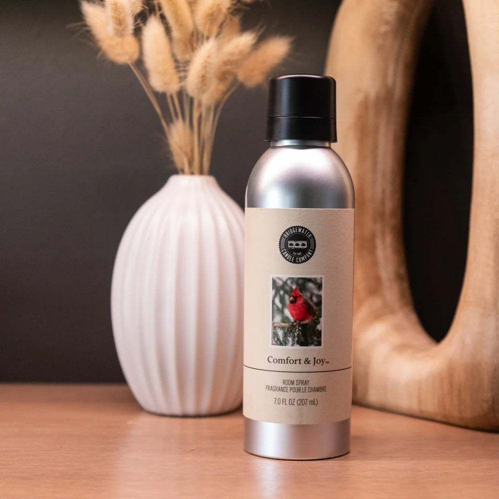 7.0 fluid ounce Comfort & Joy Non-Aerosol Room Spray bottle with a red cardinal label.