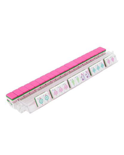 Amara Mahjong Tiles in pink with cartoon faces and shapes, displayed in a clear holder. Available sizes: small, medium, large.