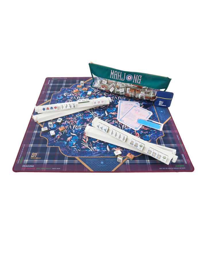Astor Mat Mahjong set: floral mat, 3 tile racks, assorted tiles, green bag, scorecards, dice &amp; chips. Sizes available.
