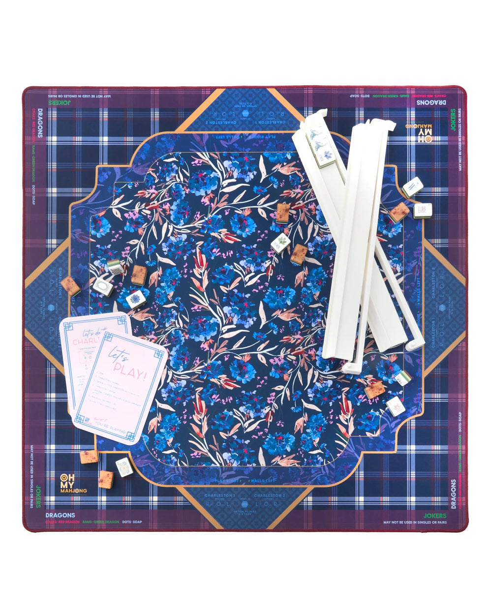 The Astor Mat is a floral Mahjong mat, available in multiple sizes. Mahjong tiles and white racks not included.