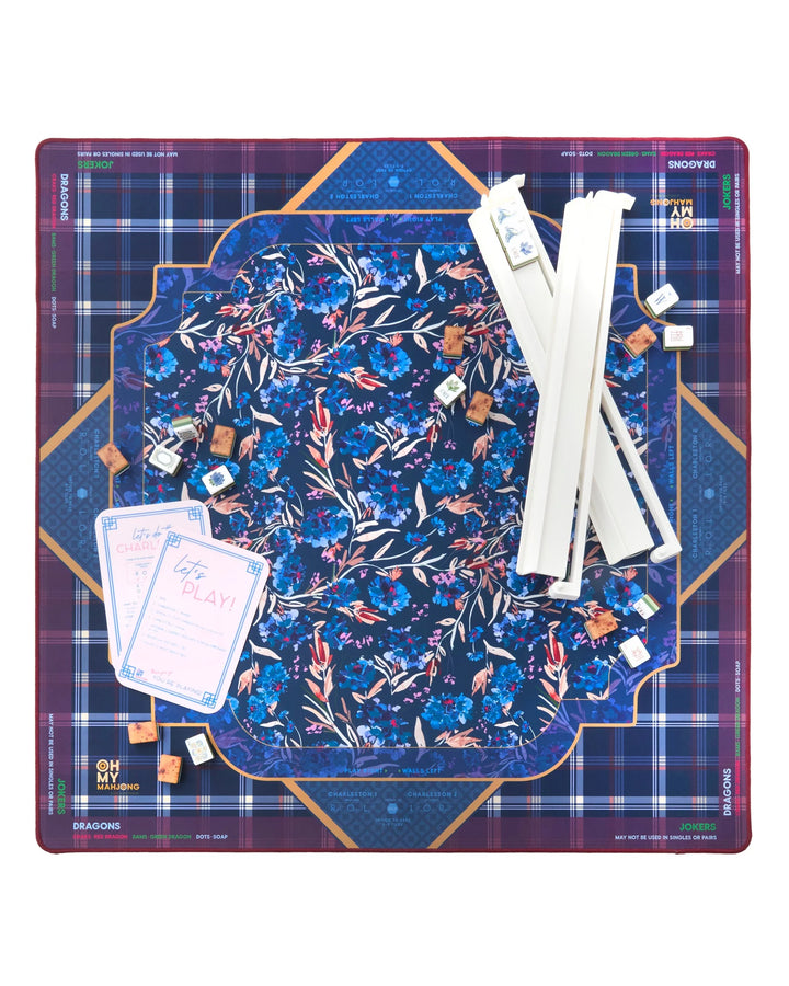 The Astor Mat is a floral Mahjong mat, available in multiple sizes. Mahjong tiles and white racks not included.