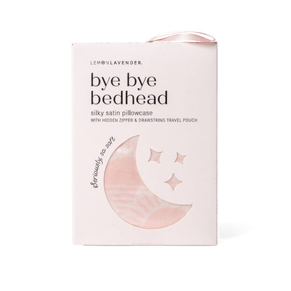 Box of Lemon Lavender Silky Pillowcase Pattern Assort with crescent moon, three stars, circular window showing pink silky pillowcase. Packaging notes hidden zipper and travel pouch. Sizes available: standard and king.