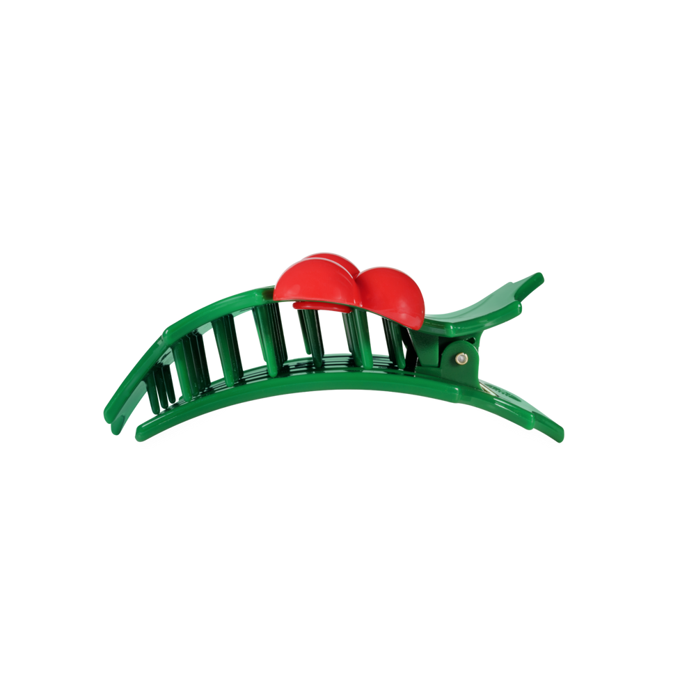 Glitter Holly Leaves flat hair clip in a green arched design with two red rounded ornaments.