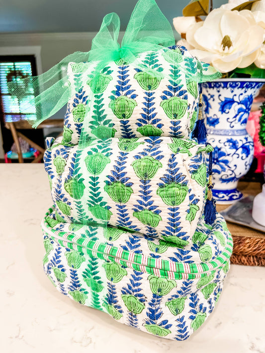 Set of three intricately patterned pouches with blue and green floral designs. Sizes: Small, Medium, Large.