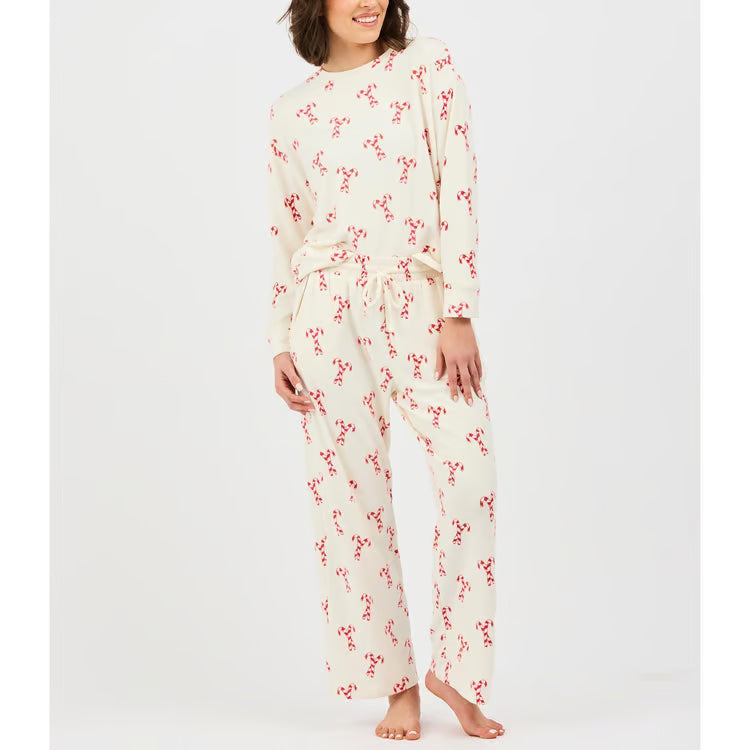 Sophie Candy Canes Pajama Set, off-white long-sleeve top and matching candy cane print pants.