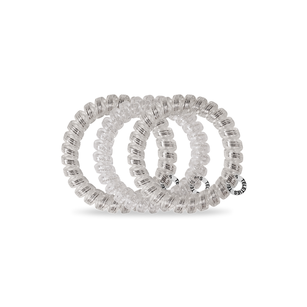 Silver Slay Spiral Hair Coils with small circular tag, available in multiple sizes, designed for all-day hold.