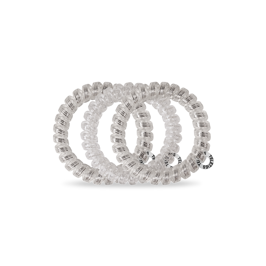 Silver Slay Spiral Hair Coils with small circular tag, available in multiple sizes, designed for all-day hold.