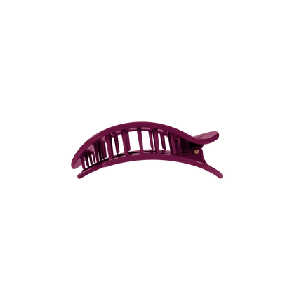 The Mulberry Small Flat Round Hair Clip has a purple curved plastic design with evenly spaced teeth and a hinge. Available in small size.