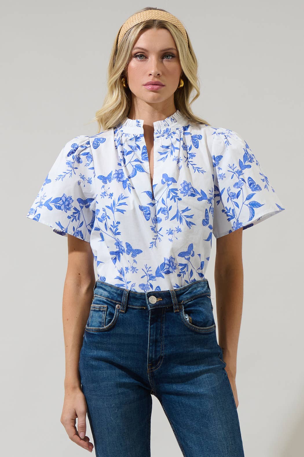 Leya Floral Inaya Split Neck Top with floral pattern and split neckline; available in sizes XS–XL.