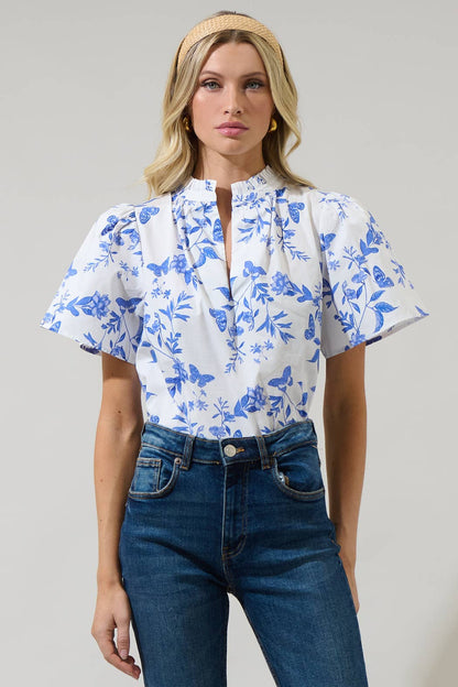 Leya Floral Inaya Split Neck Top with floral pattern and split neckline; available in sizes XS–XL.