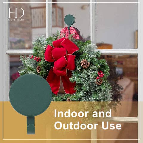Two round green Attract® Magnetic Hanger, 2 Pack units.