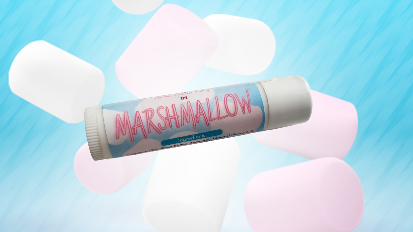 Roxy Grace Marshmallow Lip Balm tube, all-natural formula for hydrated lips; available in standard and travel sizes.