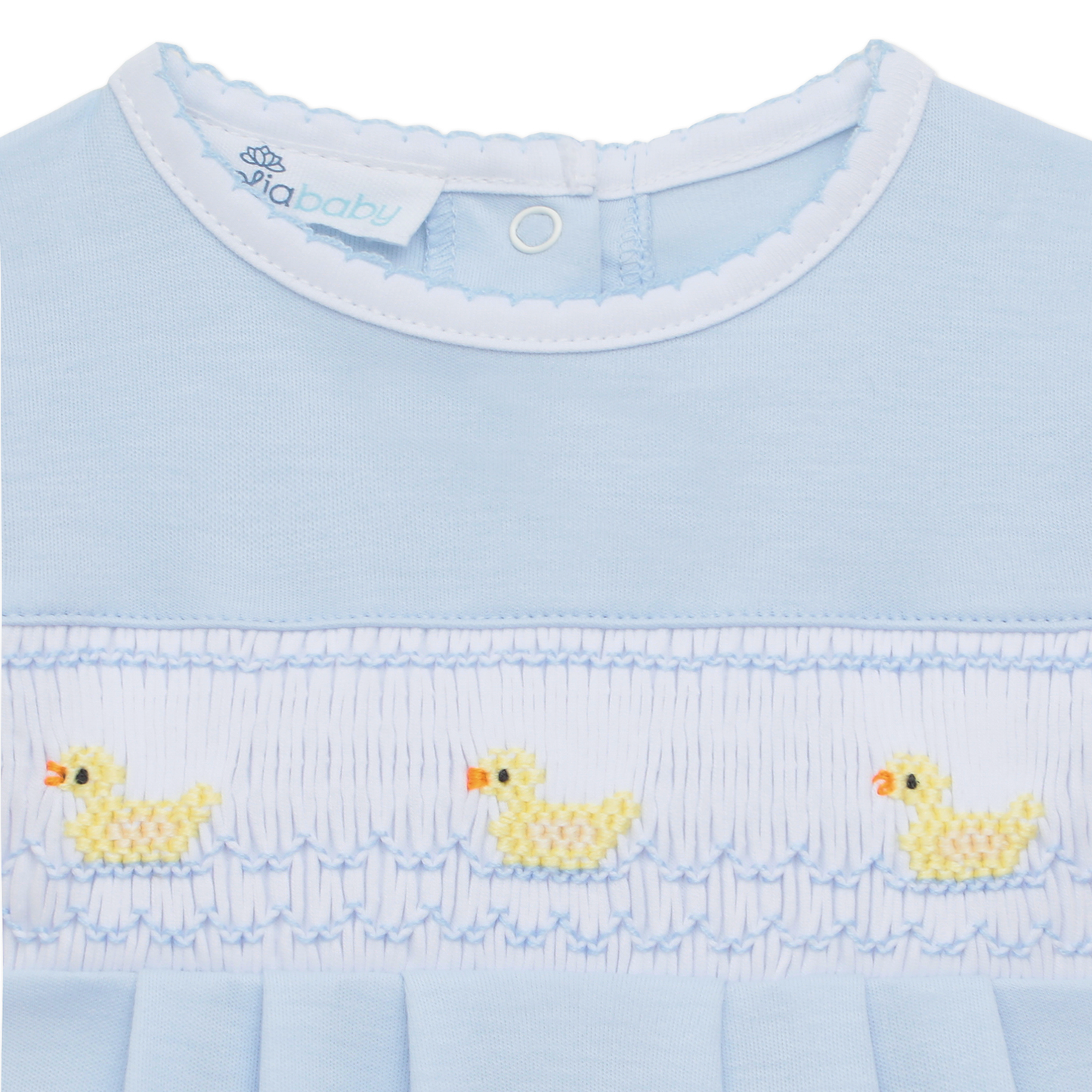 Light blue bubble with chest smocking, hand-embroidered ducklings, and “pixbaby” tag inside collar. Available in multiple sizes.